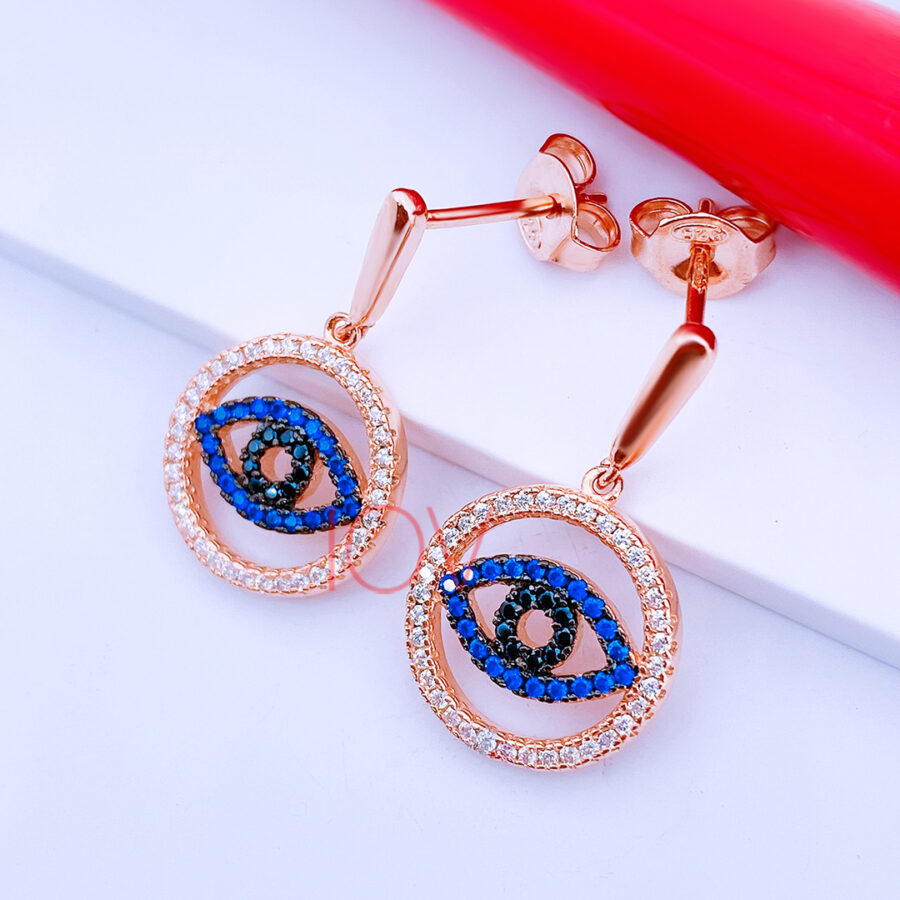 Rosegold blue eye earrings.