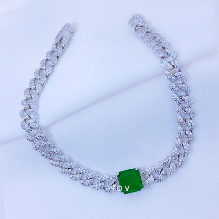 curb chain diamond style bracelet with square emerald stone.