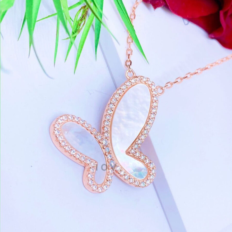 rosegold butterfly necklace with mother of pearl inlay.