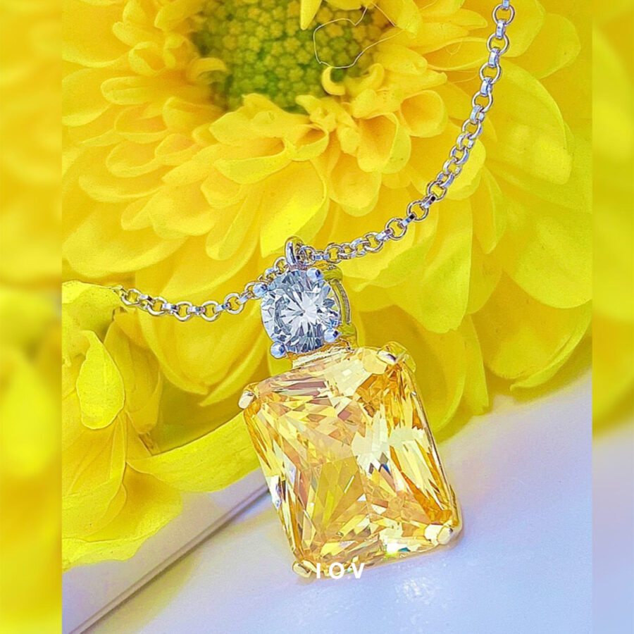Yellow diamond ice cut rectangular shape necklace.