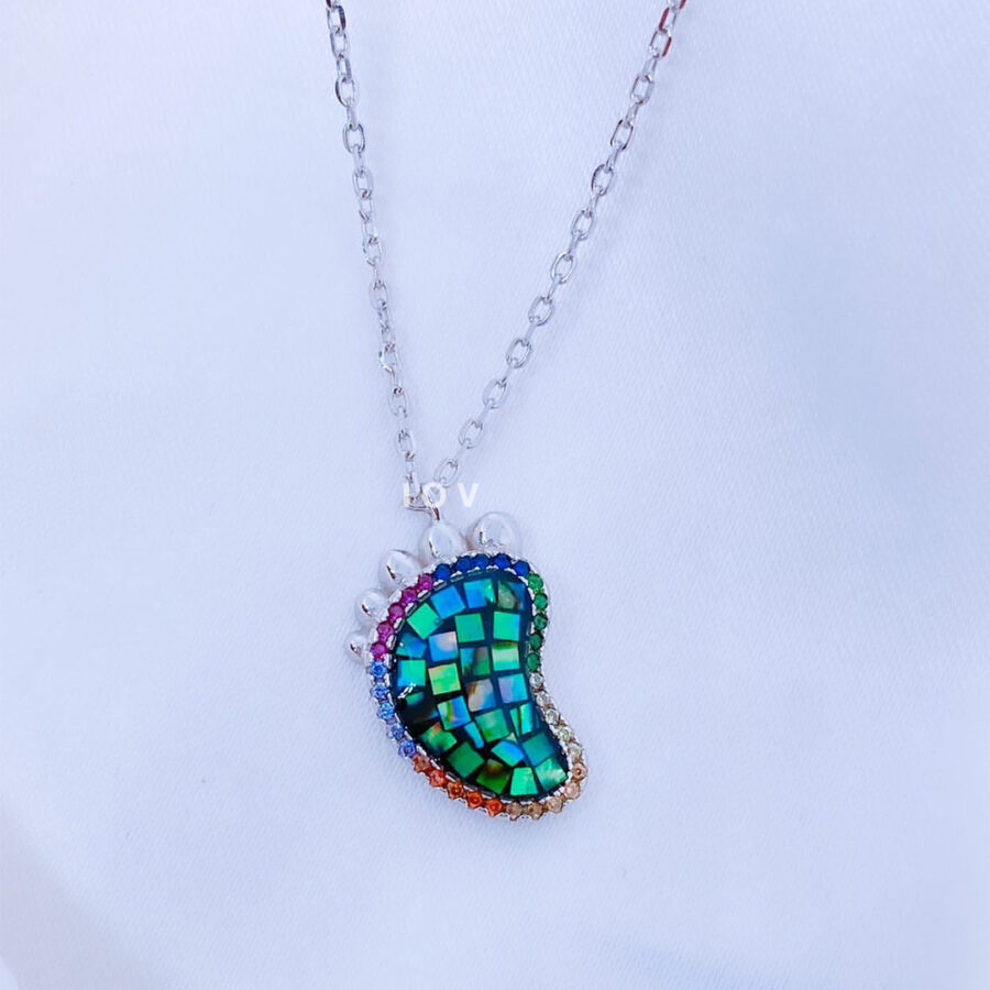foot shape necklace with opal inlay.