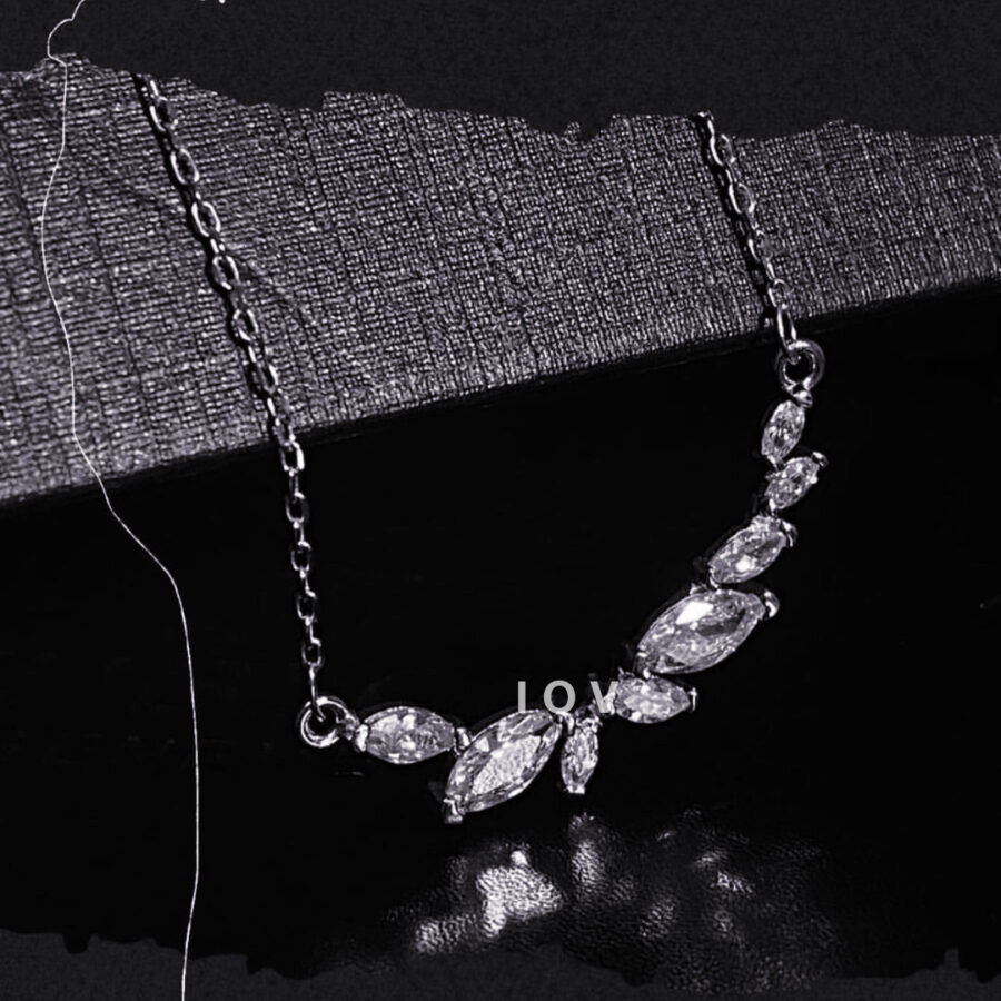 marquise stones curved bar necklace.