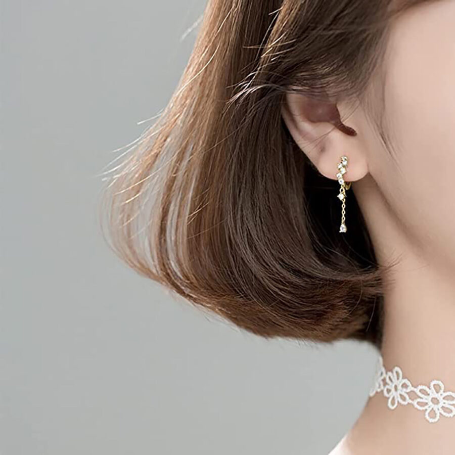golden hoop earring with dangling drop shape stone. - Image 2