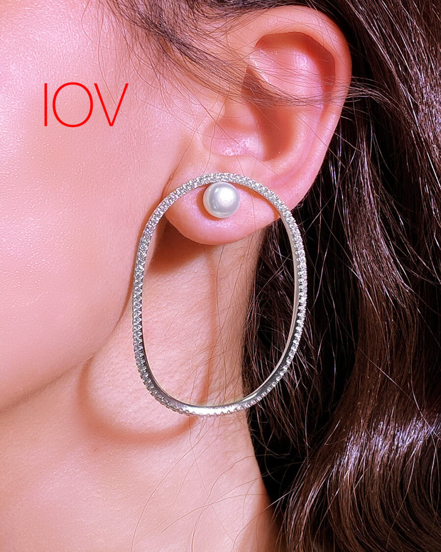 CZ hoop earring with pearl.