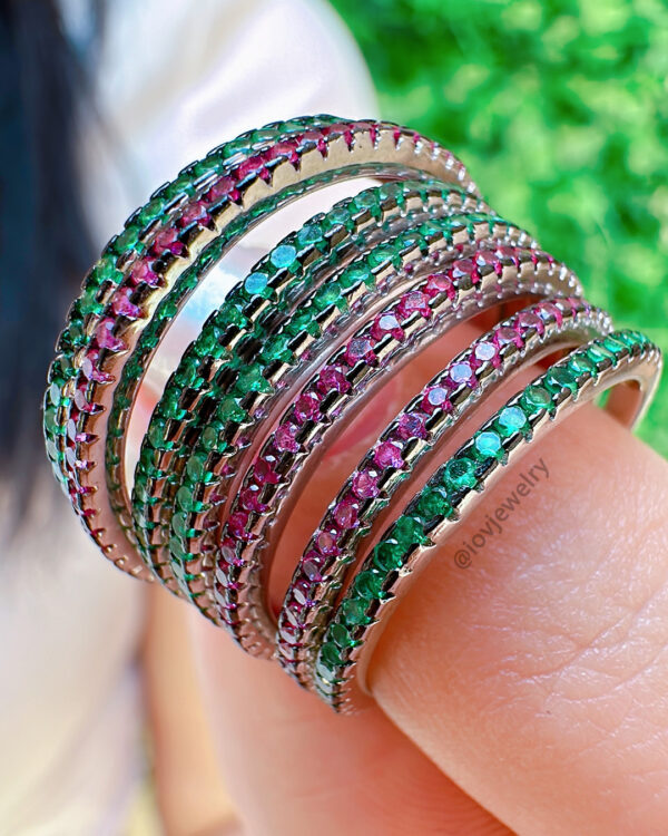 emerald and ruby color one line eternity band.