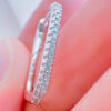 rectangular single line CZ hoop earring.