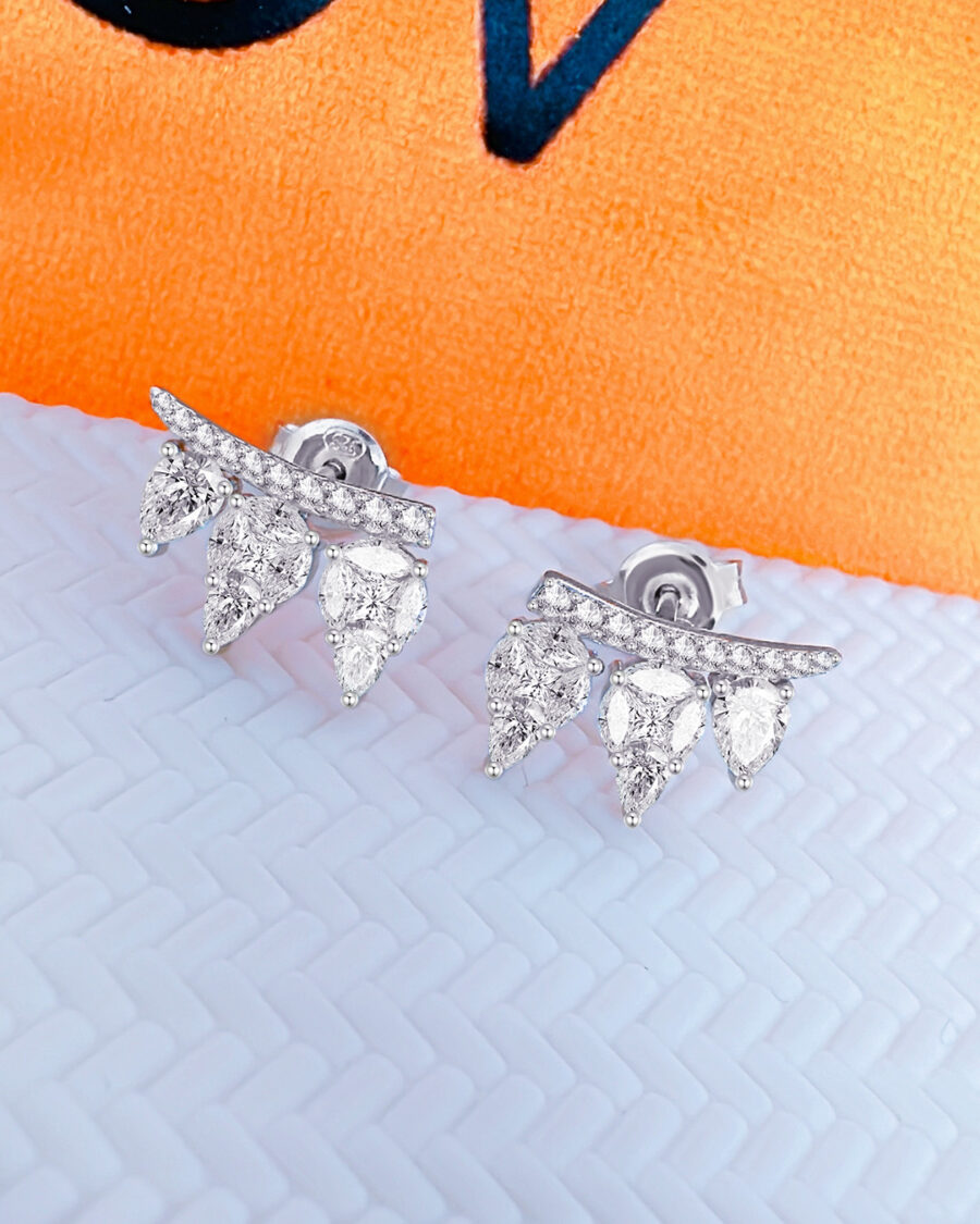 CZ marquise and pear shape stones stud earrings.