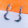 CZ multicolored dangling crescent hoop earring plated with black rhodium.