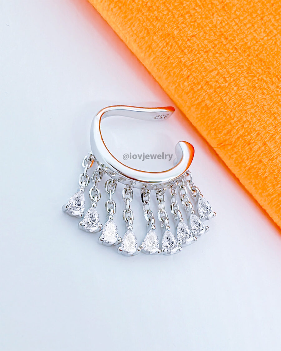 CZ dangling pear shapes earcuff. - Image 4