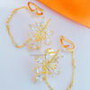 cluster of pear shapes attached to earcuff.
