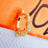 11mm huggie hoop earring with dangling small plain hoops.