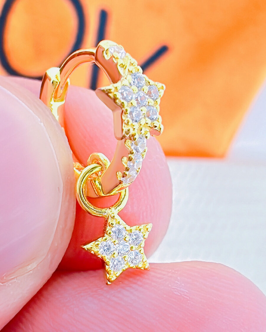CZ huggie star hoop with dangling star shape. - Image 2