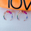 CZ multi-colored cresecnt shape rosegold earring.