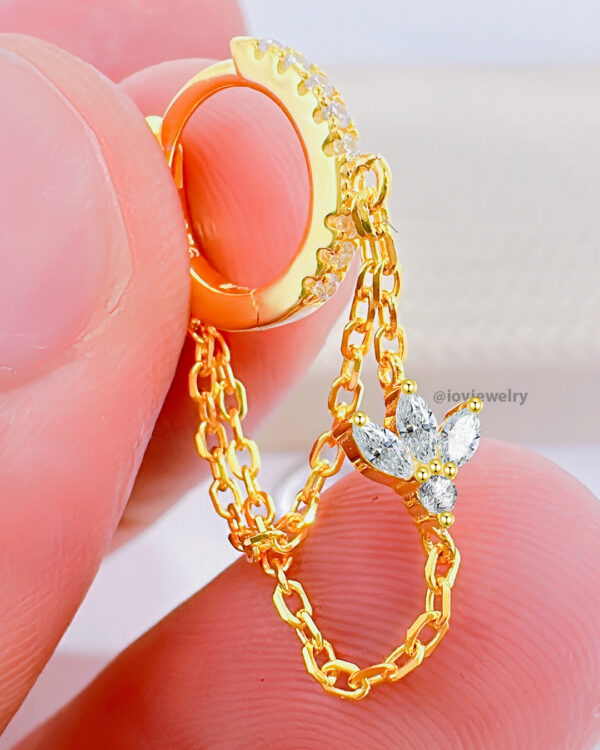 CZ huggie hoop with dangling double chains adorned with louts shape marquise stones.