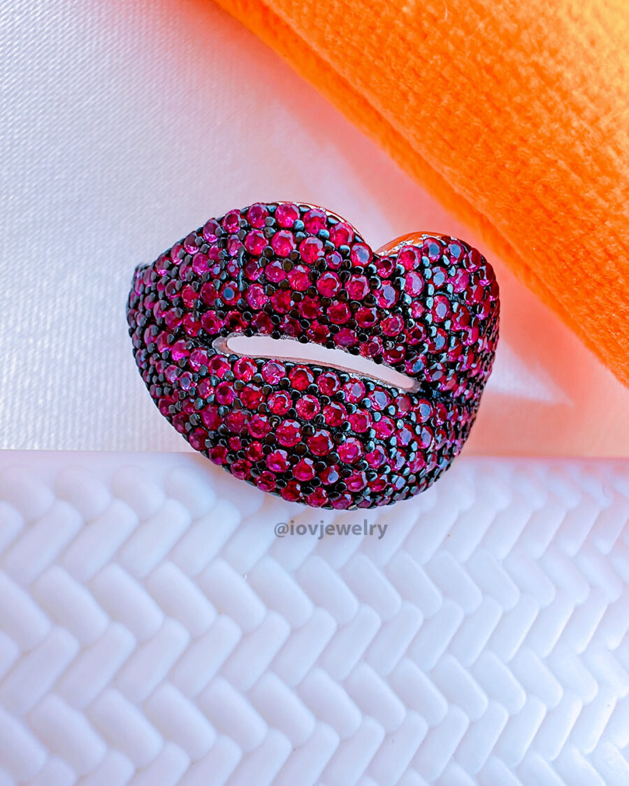 CZ ruby color studded lips shape ring.
