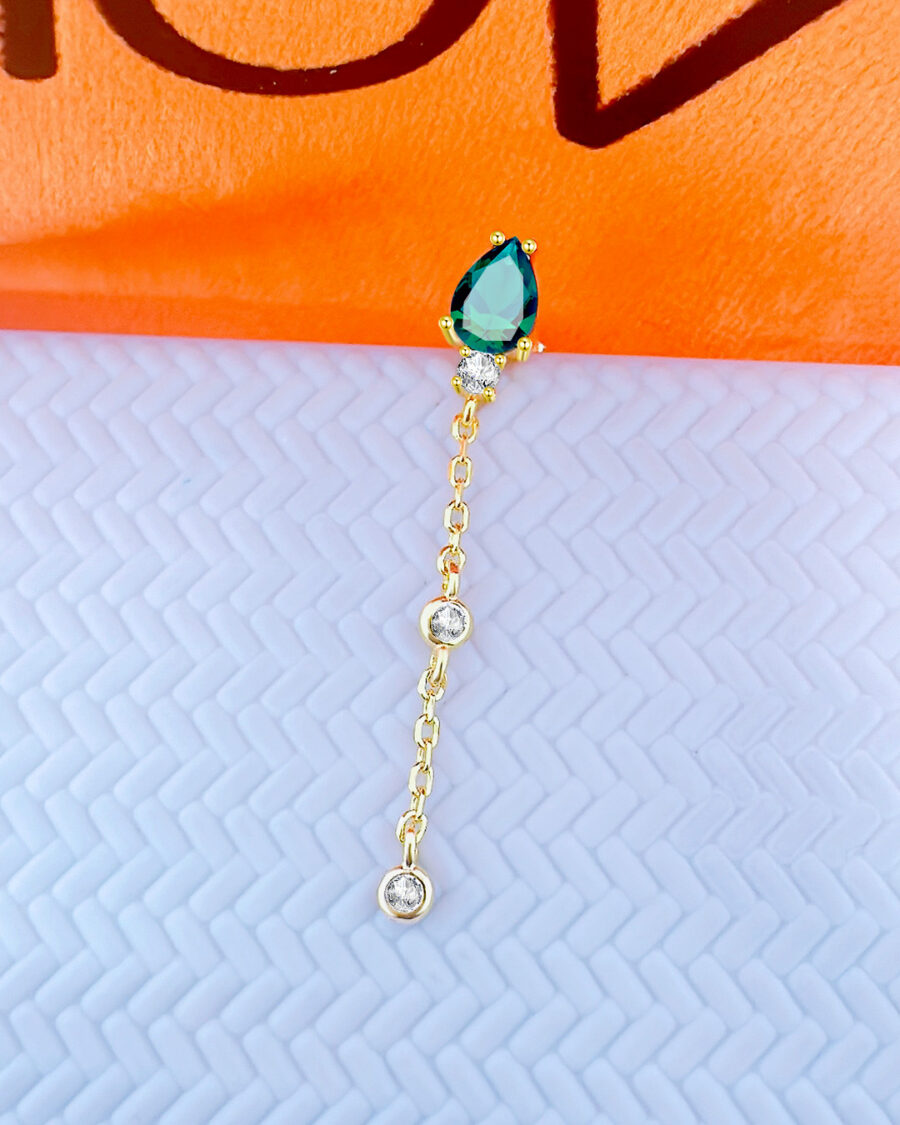 CZ emerald color pear shape stud earring with dngling chain and two white CZ in bezel setting.