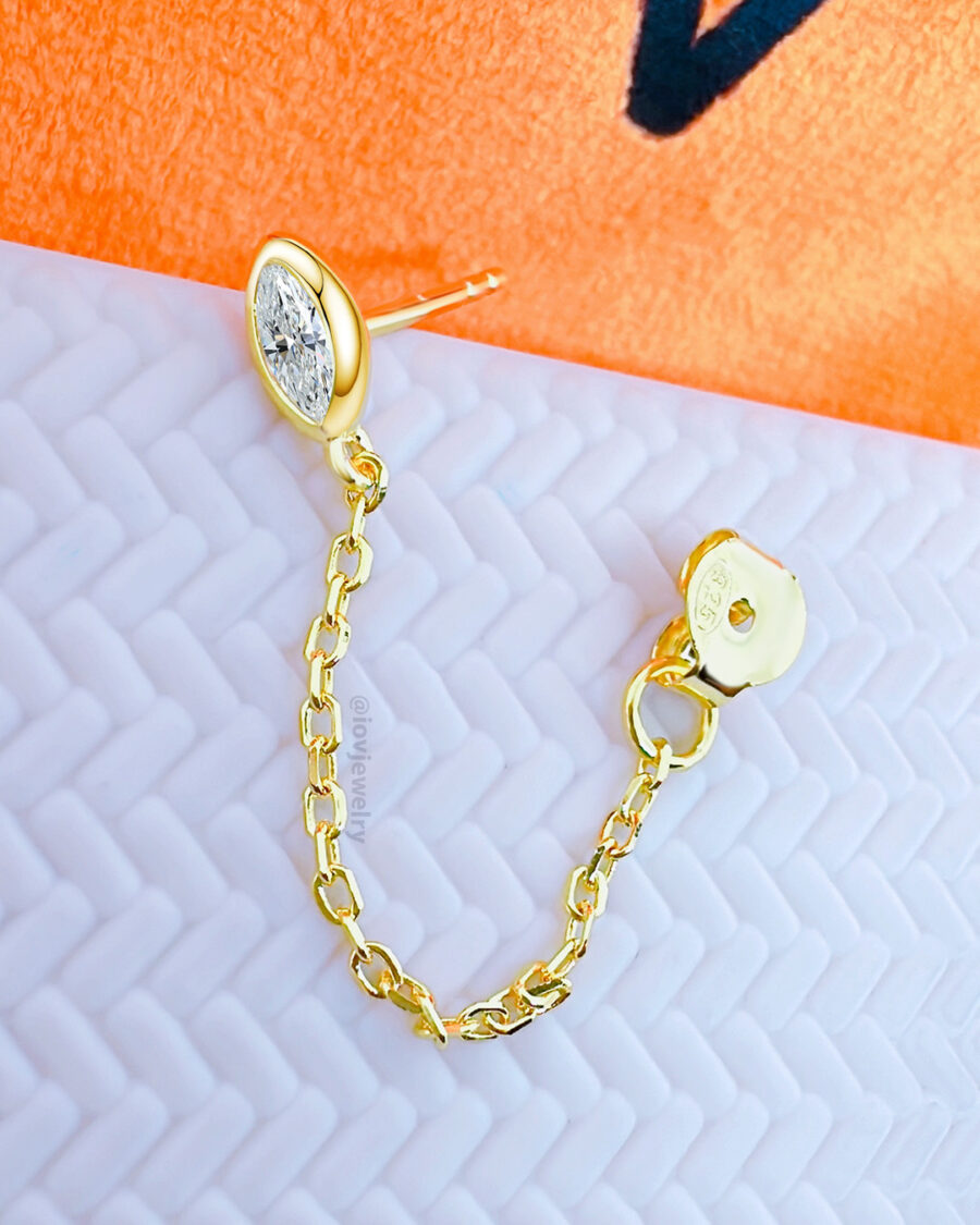 CZ marquise in a bezel setting stud earring with dangling chain linked to stud. - Image 2