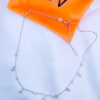 dangling CZ in bezel setting choker.