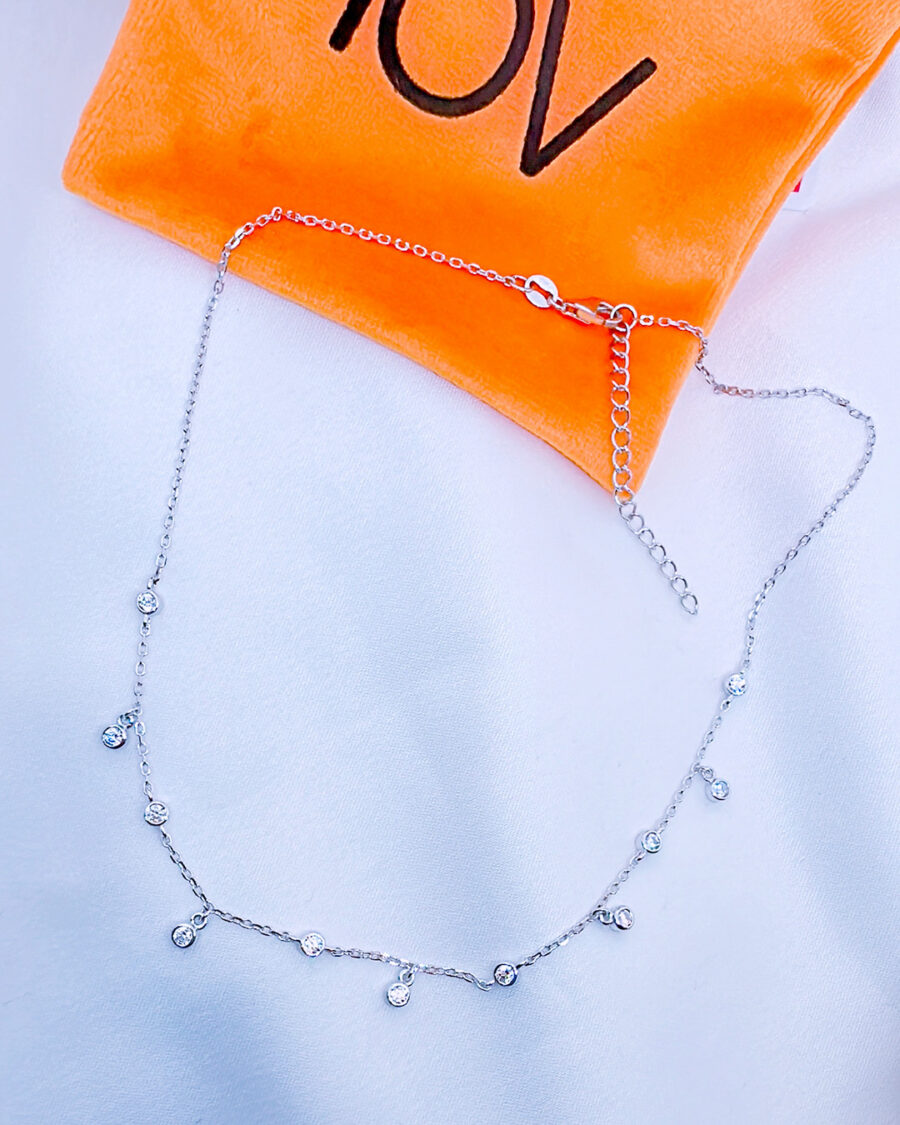 dangling CZ in bezel setting choker.