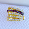 Multilines white and ruby color CZ earcuff.