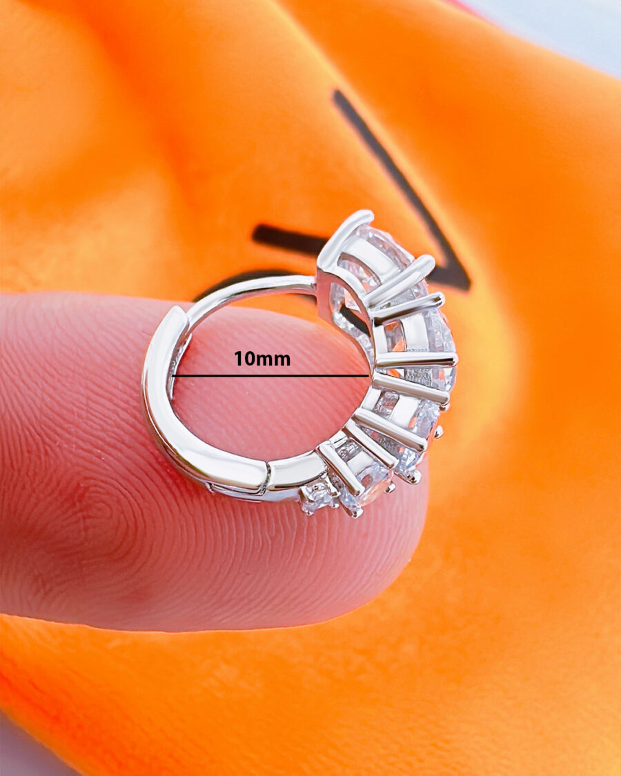 huggie hoop earring with graduated round CZ stones. - Image 2