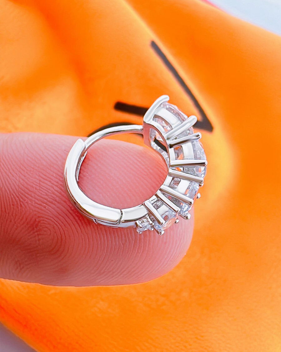 huggie hoop earring with graduated round CZ stones. - Image 3