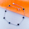 black and white four clover shape bracelet.