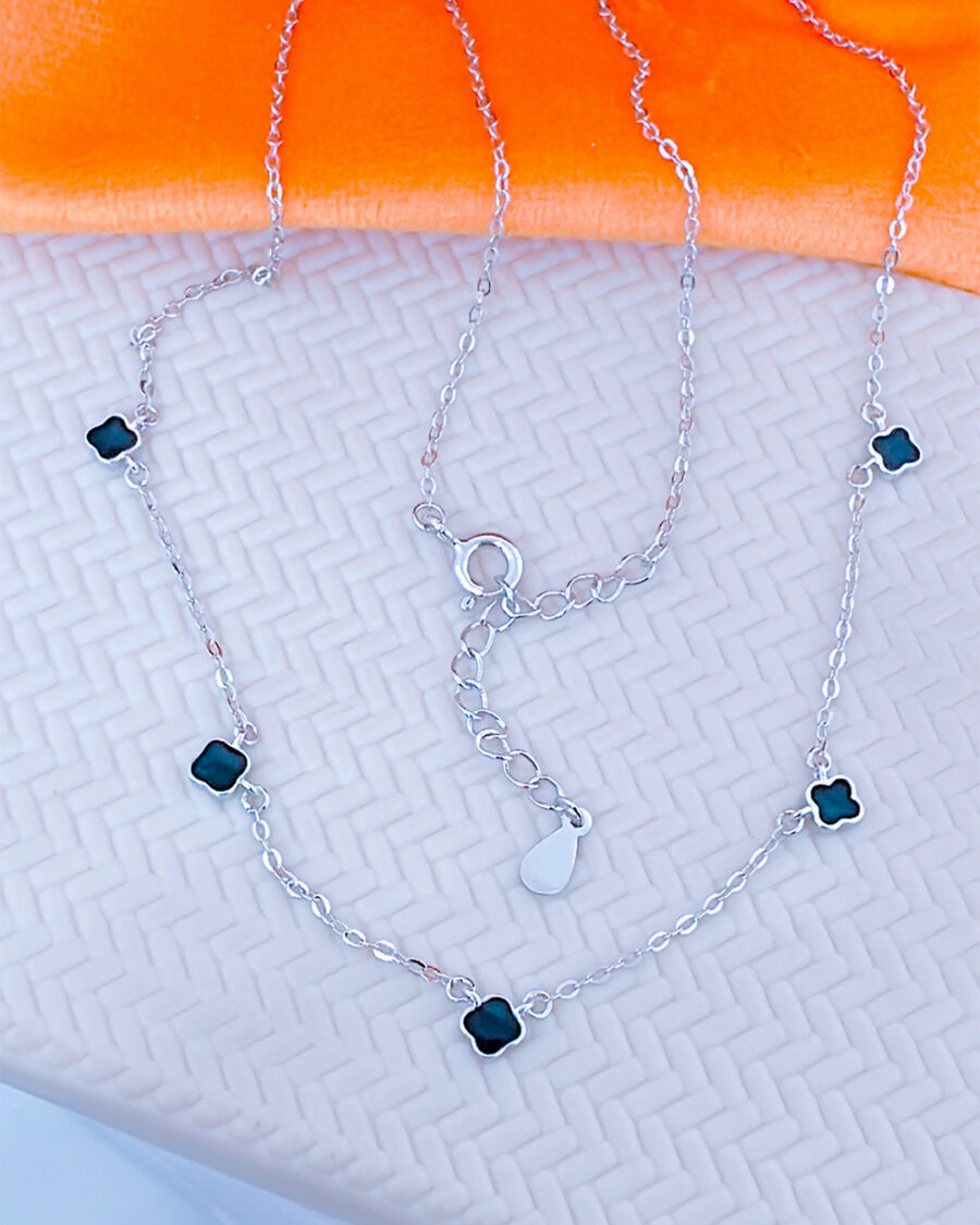 black four clover shape necklace.