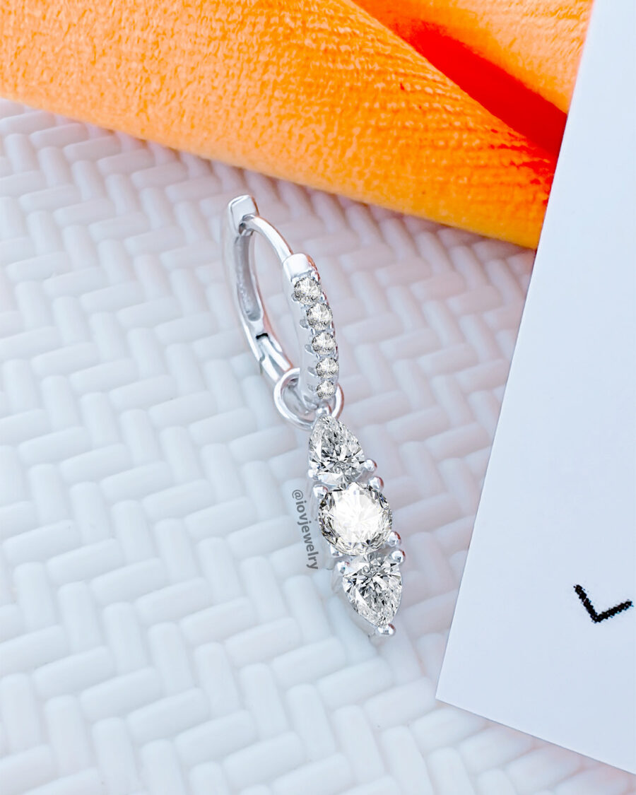 CZ huggie hoop earring with removable line of pear and round shape stones. - Image 2