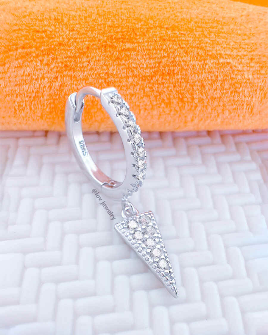 CZ huggie hoop with dangling triangle shape.