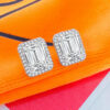 emerald cut CZ stone in a halo setting stud earrings.