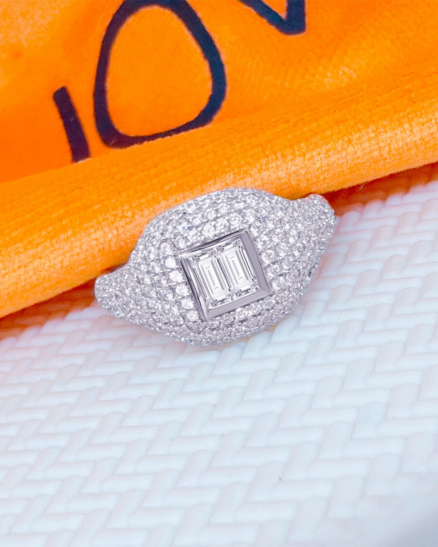 Pavé signet ring with baguette stones.