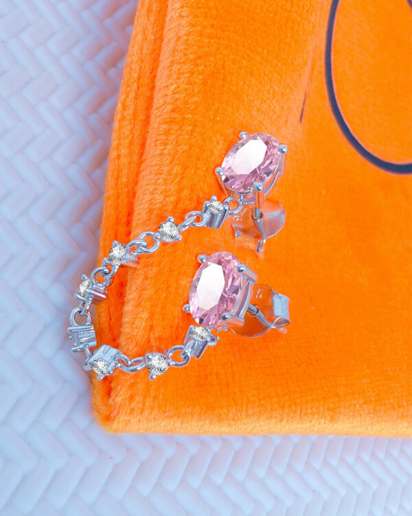 double oval pink stones linked with CZ in prong setting links.