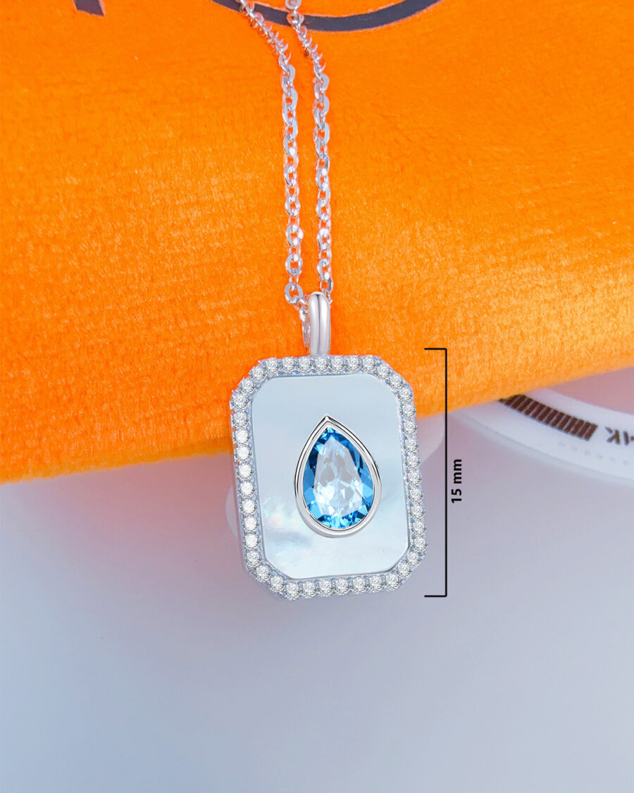 rectangular MOP necklace with pear shape aquamarine color CZ stone. - Image 2