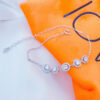 CZ cushion shapes in a halo setting bracelet.